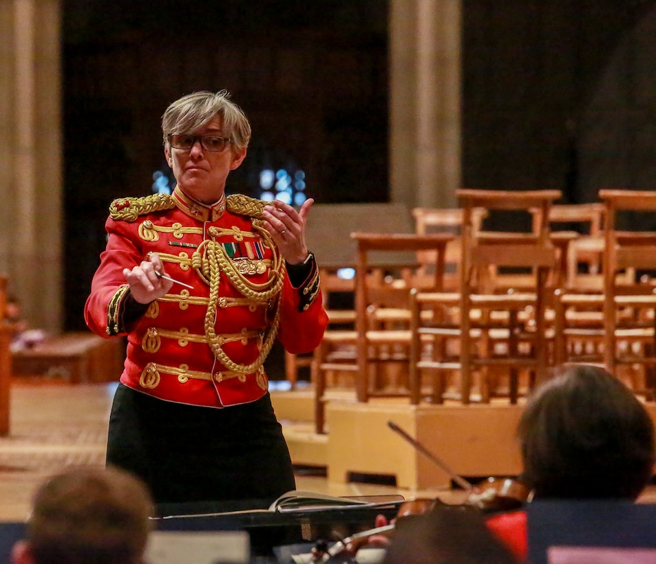 Major Michelle A. Rakers, assistant director, “The President’s Own” U.S. Marine Band, conducts the band during a Marine Corps Worship Service at the Washington National Cathedral, Washington D.C., Nov. 12, 2017. The service was held to commemorate the 242nd Anniversary of the Marine Corps. The 19th Chaplain of the Marine Corps, Rear Adm. Brent W. Scott, addressed his message to the guests in attendance. (Official U.S. Marine Corps photo by Cpl. Robert Knapp/Released)