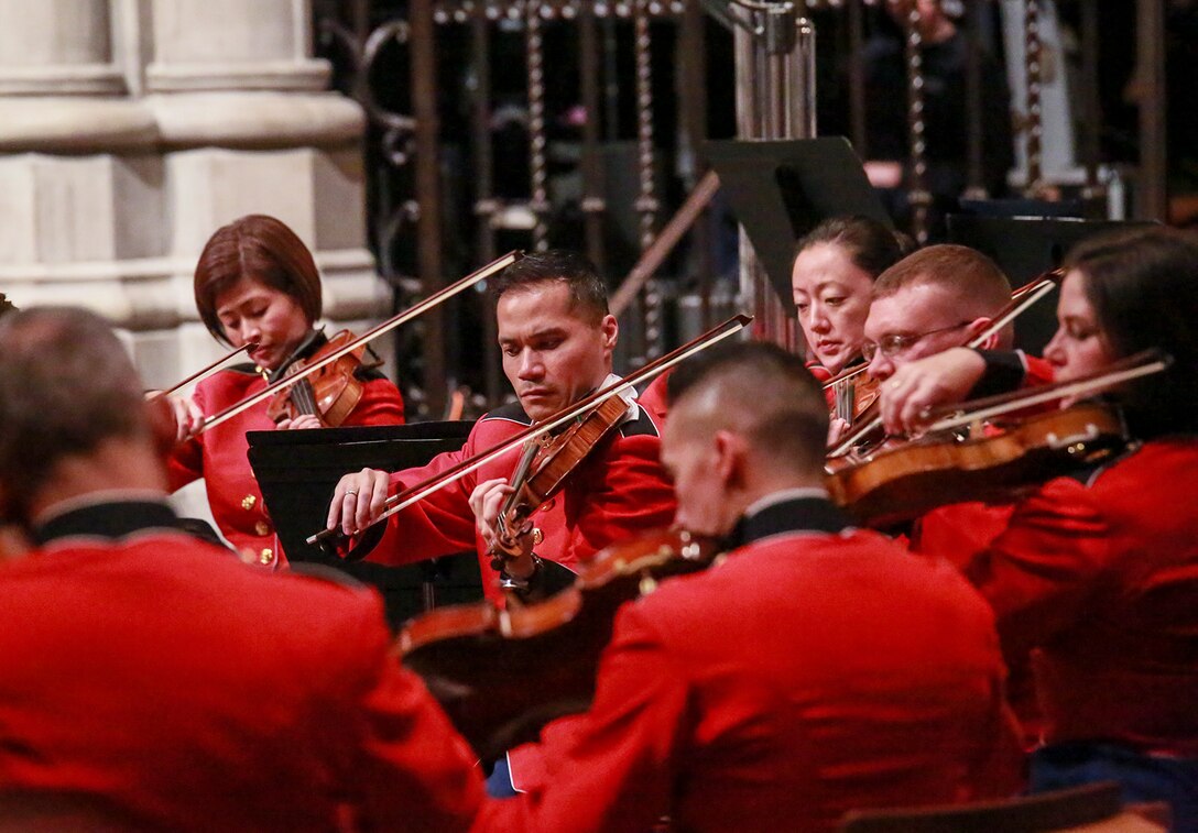 Marines with “The President’s Own” U.S. Marine Band, perform musical ballads during a Marine Corps Worship Service at the Washington National Cathedral, Washington D.C., Nov. 12, 2017. The service was held to commemorate the 242nd Anniversary of the Marine Corps. The 19th Chaplain of the Marine Corps, Rear Adm. Brent W. Scott, addressed his message to the guests in attendance. (Official U.S. Marine Corps photo by Cpl. Robert Knapp/Released)