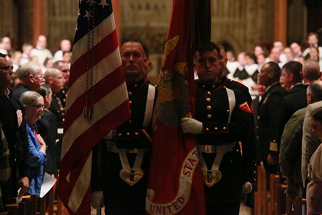 The U.S. Marine Corps Color Guard retires the National and Marine Corps Colors at the conclusion of a Marine Corps Worship Service at the Washington National Cathedral, Washington D.C., Nov. 12, 2017. The service was held to commemorate the 242nd Anniversary of the Marine Corps. The 19th Chaplain of the Marine Corps, Rear Adm. Brent W. Scott, addressed his message to the guests in attendance. (Official U.S. Marine Corps photo by Cpl. Robert Knapp/Released)