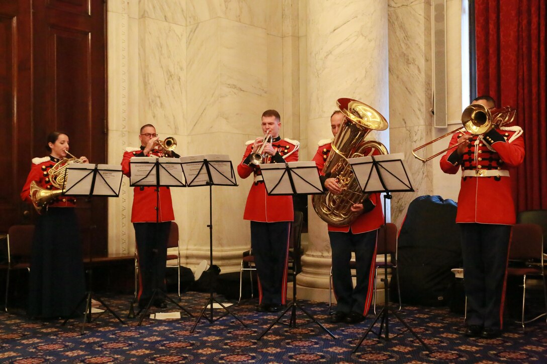 Marines with “The President’s Own” U.S. Marine Band, perform during a cake cutting ceremony to celebrate the Marine Corps’ 242nd birthday at the Russell Senate Office Building, Washington D.C., Nov. 15, 2017. The guest of honor for the ceremony was the Senator of Indiana, the Honorable Todd Young, and the hosting official was the Commandant of the Marine Corps, Gen. Robert B. Neller. (Official U.S. Marine Corps photo by Cpl. Robert Knapp/Released)