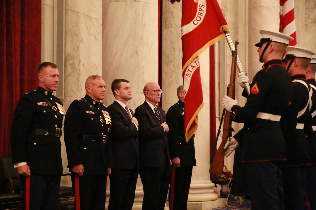 Members of the official party render honors as the National and Marine Corps Colors are presented by the U.S. Marine Corps Color Guard during a cake cutting ceremony to celebrate the Marine Corps’ 242nd birthday at the Russell Senate Office Building, Washington D.C., Nov. 15, 2017. The guest of honor for the ceremony was the Senator of Indiana, the Honorable Todd Young, and the hosting official was the Commandant of the Marine Corps, Gen. Robert B. Neller. (Official U.S. Marine Corps photo by Cpl. Robert Knapp/Released)