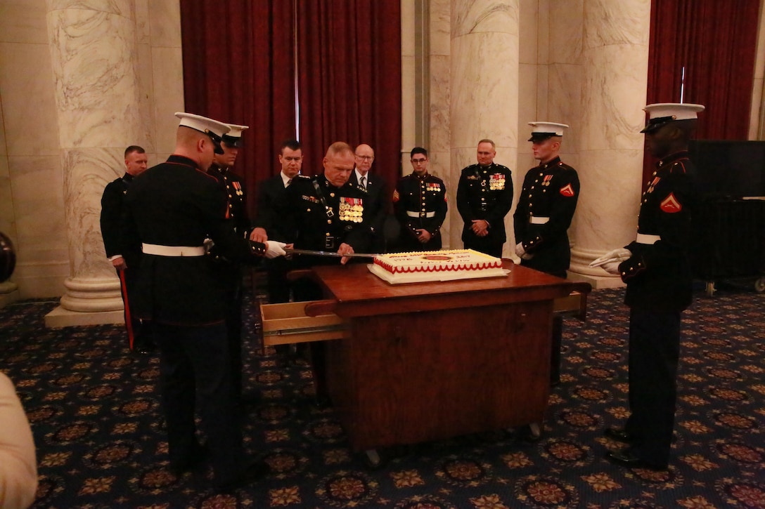 The Commandant of the Marine Corps, Gen. Robert B. Neller, cuts the traditional birthday cake during a ceremony to celebrate the Marine Corps’ 242nd birthday at the Russell Senate Office Building, Washington D.C., Nov. 15, 2017. The guest of honor for the ceremony was the Senator of Indiana, the Honorable Todd Young, and the hosting official was the Commandant of the Marine Corps. (Official U.S. Marine Corps photo by Cpl. Robert Knapp/Released)