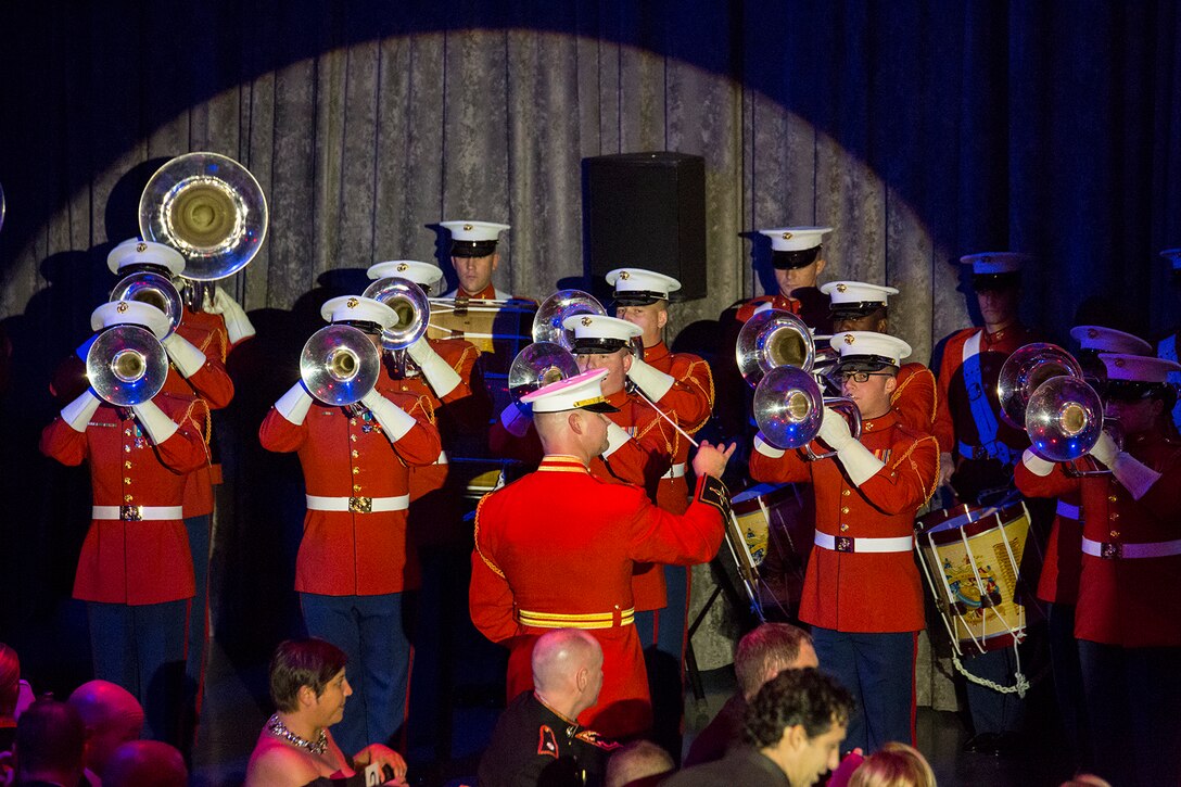 Captain James D. Foley, executive officer, “The Commandant’s Own” U.S. Marine Drum & Bugle Corps, conducts the D&B during the 242nd Marine Corps Birthday Gala aboard the USS Intrepid Sea, Air, and Space Museum, New York City, NY, Nov. 8, 2017. Every year, the Barracks travels throughout the National Capital Region and numerous other locations to honor and celebrate the birthday of the Corps. (Official U.S. Marine Corps photo by Cpl. Robert Knapp/Released)