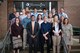 Members of the Air Force Research Laboratory-Carroll High School iGEM team stand with their CHS teachers and AFRL mentors in front of the 711th Human Performance Wing headquarters building following a presentation given to the 711HPW Chief Scientist Dr. Rajesh Naik (front, second from left).  (U.S. Air Force photo/Richard Eldridge)