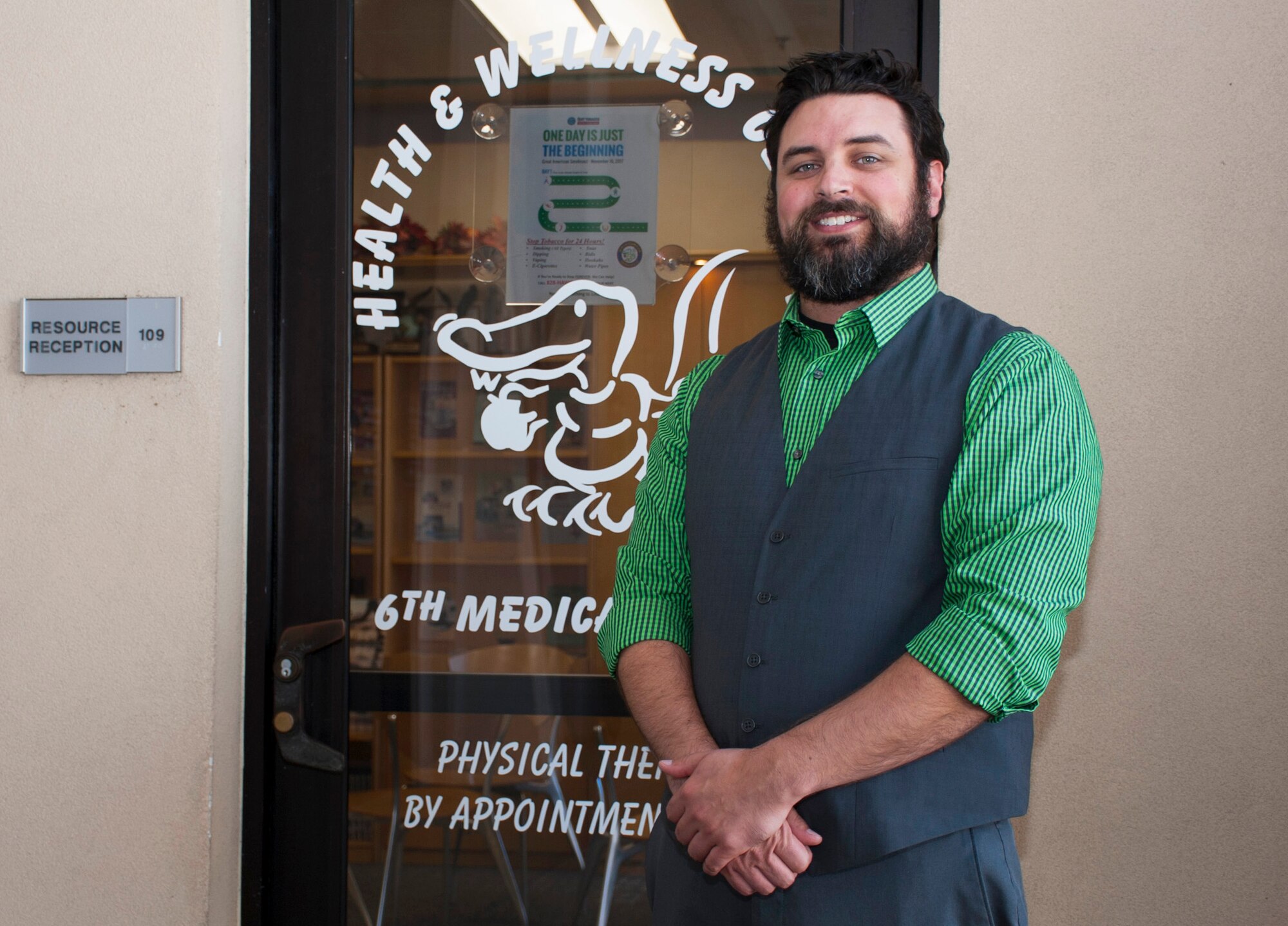 Tom Cormier, a health promotion coordinator with the 6th Aerospace Medicine Squadron, pauses for a photo in front of the Health and Wellness Center at MacDill Air Force Base, Fla., Nov. 16, 2017.