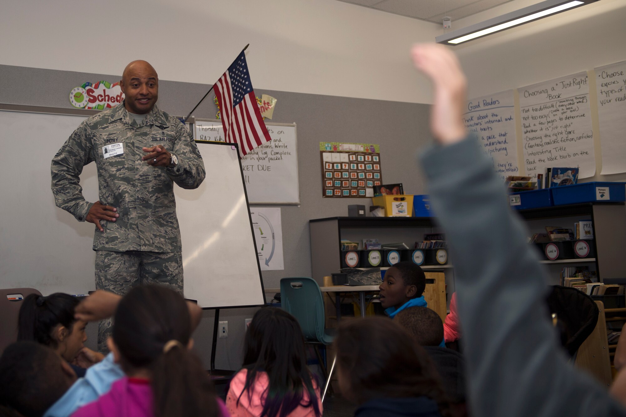 Chief Master Sgt. Rod Lindsey, 460th Space Wing command chief, speaks to students at Edna and John W. Mosley P-8 School Nov. 9, 2017, in Aurora, Colo.