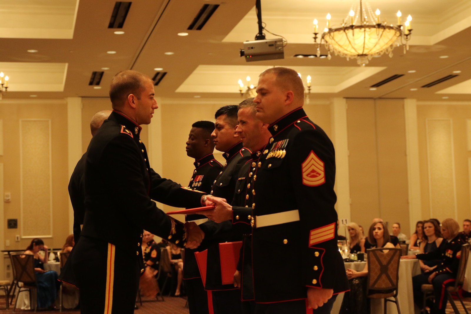 SSgt Robert Atherton is awarded the Rookie Recruiter of the year for Recruiting Station Oklahoma City for his superb dedication and achievements during his first year of recruiting.  Atherton is now the Staff NCOIC for Recruiting Substation Claremore.