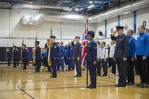 Allied Air Component Command inter-nation orienteering competitors salute during the American national anthem at Royal Air Force Lakenheath, England, Nov. 15. Members of multiple NATO nations participated in the event, which included teams from the Belgium Air Force, Polish Air Force, Royal Netherlands Air Force, German Air Force, Royal Air Force, and the U.S. Air Forces in Europe.
