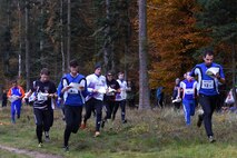 Allied Air Command inter-nation orienteering competitors run through a course at Brandon Country Park, England, Nov. 15. Members of multiple NATO nations participated in the event, which featured teams from the Belgium Air Force, Polish Air Force, Royal Netherlands Air Force, German Air Force, Royal Air Force, and the U.S. Air Forces in Europe.