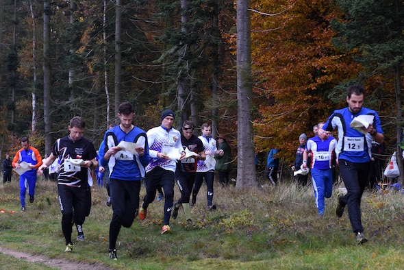 Allied Air Command inter-nation orienteering competitors run through a course at Brandon Country Park, England, Nov. 15. Members of multiple NATO nations participated in the event, which featured teams from the Belgium Air Force, Polish Air Force, Royal Netherlands Air Force, German Air Force, Royal Air Force, and the U.S. Air Forces in Europe.