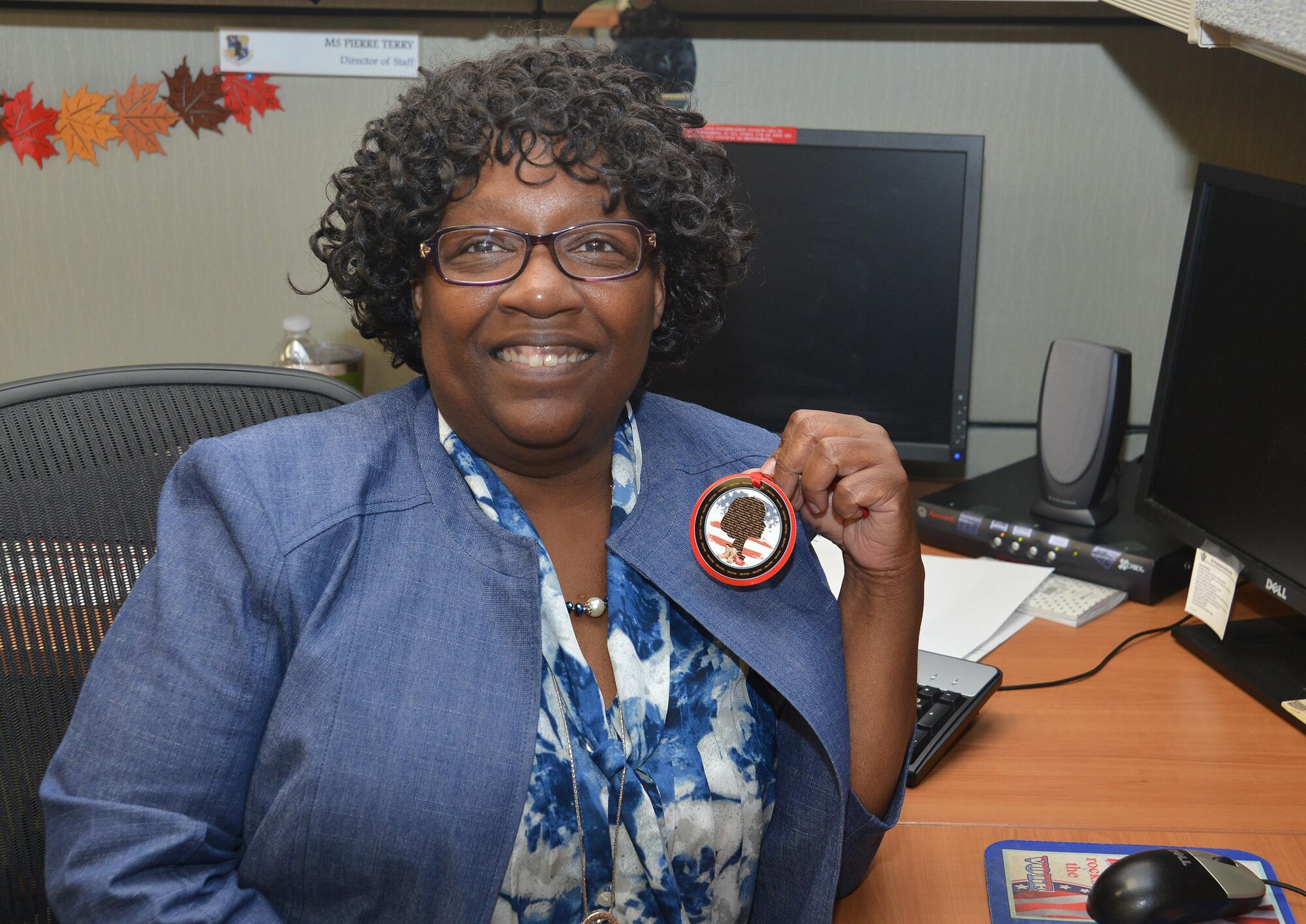 Pierre Terry, director of staff, 25th Air Force’s Logistics, Engineering and Force Protection Directorate (A4), is the civilian recipient of the 2018 Brig. Gen. Wilma Vaught Visionary Leadership Award for Air Combat Command. Terry holds the 25th Air Force INSPIRE program emblem she designed.