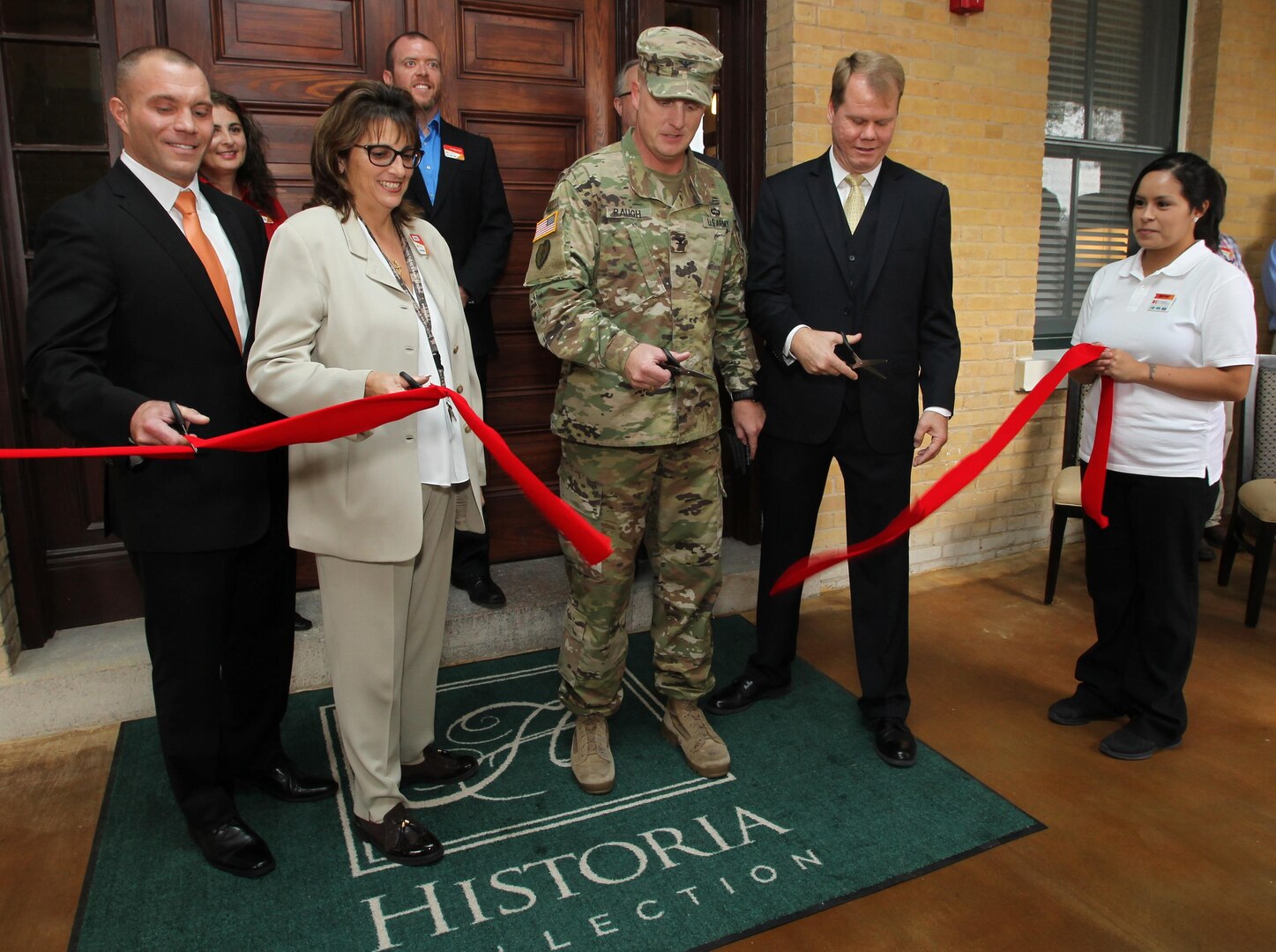 Participating in the ribbon cutting were Col. David Raugh, 502nd Force Support Group commander at JBSA-Fort Sam Houston, and representatives from Lendlease, the company that owns the Foulois House and oversaw the house’s renovation.
