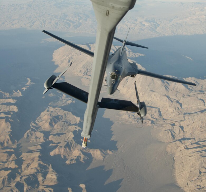 A B-1B Lancer from Ellsworth Air Force Base, S.D., approaches a Travis AFB, Calif., KC-10 Extender during an aerial refueling training mission near Edwards AFB, Calif., Nov. 1, 2017. The B-1B was part of exercise Green Flag, which is an advanced, realistic and relevant air-to-surface training exercise that prepares joint and coalition warfighters to meet combatant commanders requirements across air, space and cyberspace. (U.S. Air Force photo by Staff Sgt. Nicole Leidholm)