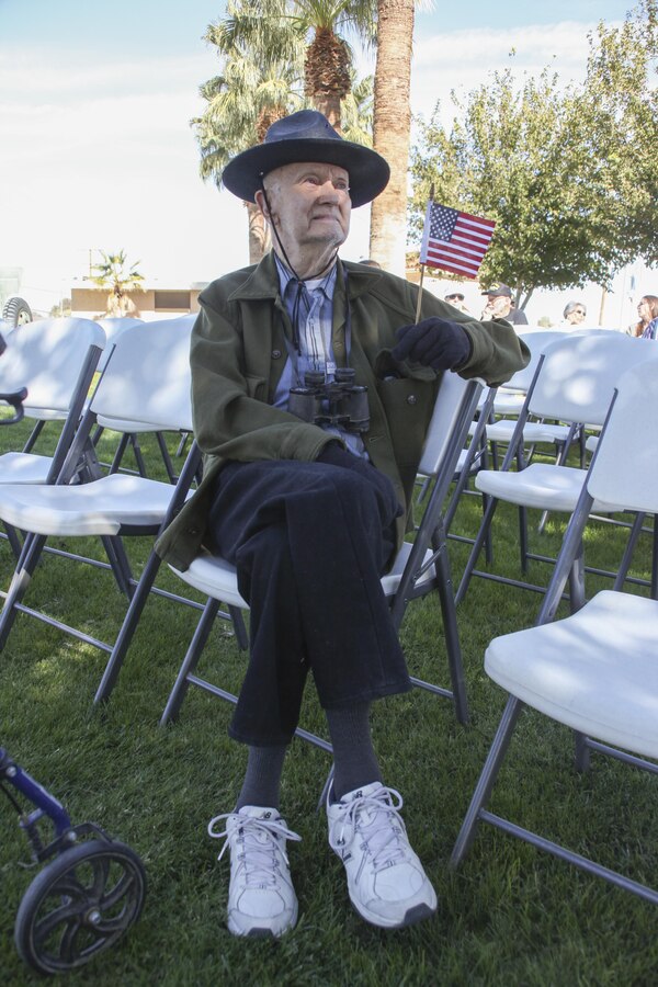Army veteran Kenneth Hansen shows his support to active and retired service members during the Morongo Basin Veterans Day tribute at Veterans Park in Twentynine Palms, Calif., Nov. 11, 2017. The community of Twentynine Palms commemorated Veterans Day to show support to the men and women who have served in the armed services. (U.S. Marine Corps photo by Cpl. Natalia Cuevas)