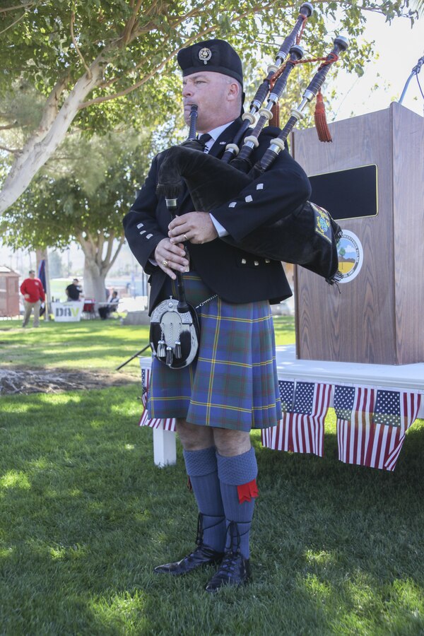 Retired Gunnery Sgt. Joel M. Daniel, professional bagpiper, plays different songs during the Morongo Basin Veterans Day tribute at Veterans Park in Twentynine Palms, Calif., Nov. 11, 2017. The community of Twentynine Palms commemorated Veterans Day to show support to the men and women who have served in the armed services. (U.S. Marine Corps photo by Cpl. Natalia Cuevas)