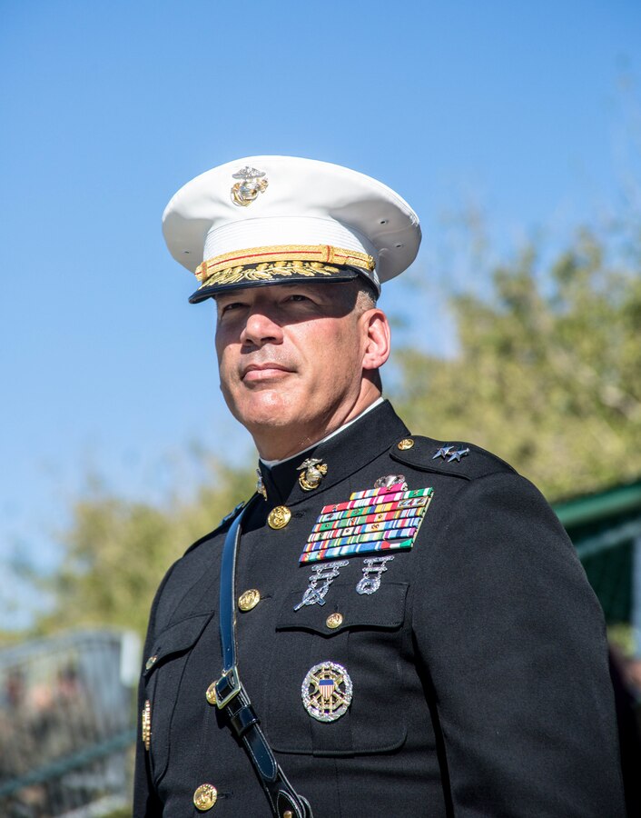 Maj. Gen. William F Mullen III, Commanding General, Marine Air Ground Task Force Training Command, stands for the National Anthem during the Marine Corps Birthday Pageant, at Lance Cpl. Torrey L. Gray Field aboard the Marine Corps Air Ground Combat Center, Twentynine Palms, Calif., Nov. 08, 2017. The event included a historical uniform pageant and the traditional cake cutting ceremony in honor of the Marine Corps birthday. (U.S. Marine Corps photo by Pfc. William J. Chockey III)