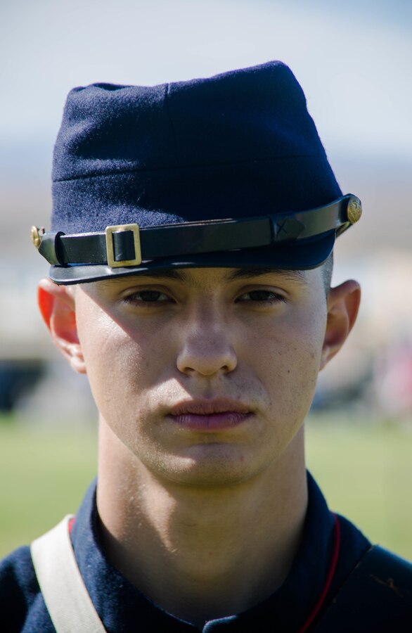 A Marine dressed as a Civil War Marine stands at attention during the Marine Corps Birthday Pageant, at Lance Cpl. Torrey L. Gray Field aboard the Marine Corps Air Ground Combat Center, Twentynine Palms, Calif., Nov. 08, 2017. The event included a historical uniform pageant and the traditional cake cutting ceremony in honor of the Marine Corps birthday. (U.S. Marine Corps photo by Pfc. William J. Chockey III)