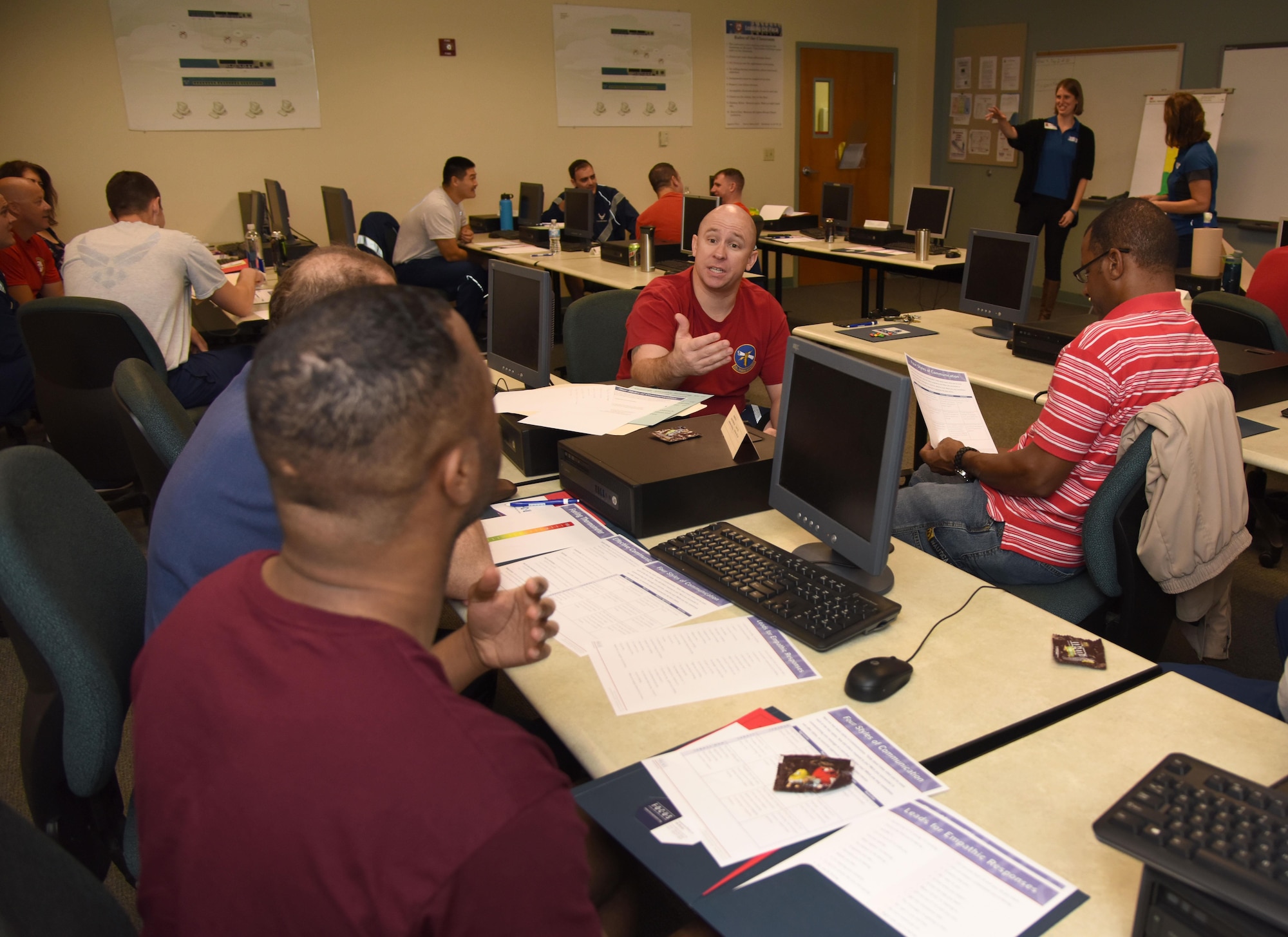 Keesler Airmen participate in a communication training class during Wingman Day Nov. 16, 2017, on Keesler Air Force Base, Mississippi. Wingman Day consisted of Keesler Airmen participating in unit-wide Comprehensive Airman Fitness courses which focused on resiliency and teambuilding initiatives across the base. (U.S. Air Force photo by Kemberly Groue)