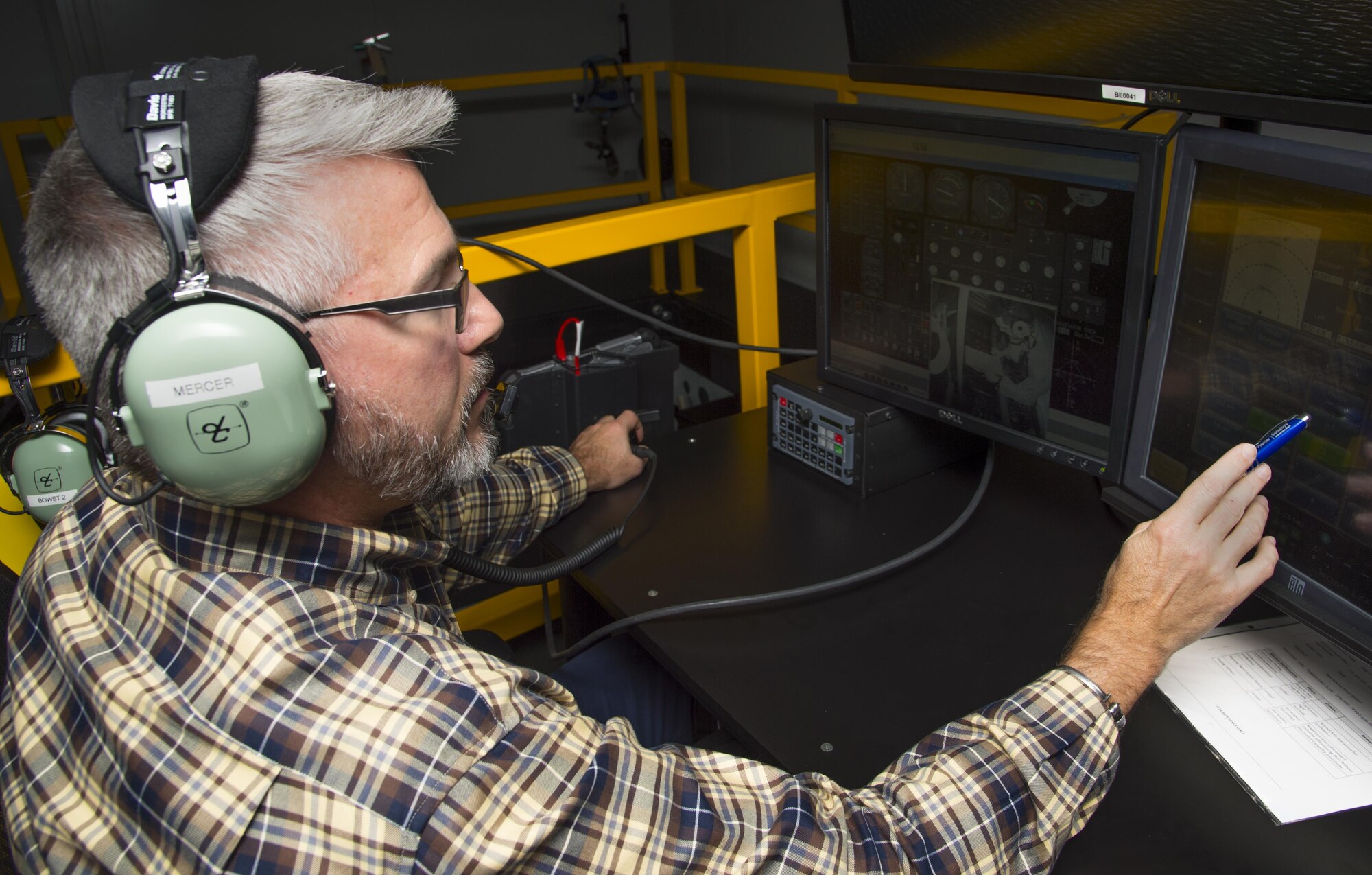 John Mercer, a Boom Operator Weapon System Trainer (BOWST) Instructor assigned to the 6th Operations Support Squadron, operates the instructor portion of the BOWST, Nov. 8, 2017, at MacDill Air Force Base, Fla. The BOWST trains Airmen on normal procedures and on possible malfunctions in a simulator.  (U.S. Air Force photo by Senior Airman Mariette Adams)