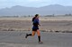 Senior Airman Andrea Evans, 56th Civil Engineer Squadron structures journeyman, runs towards the finish line during a 5K run at Luke Air Force Base, Ariz., Nov. 17, 2017. Evans was the first female to cross the finish line. (U.S. Air Force photo/Airman 1st Class Pedro Mota)