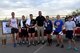 Six runners with the best run finish times receive their trophies at Luke Air Force Base, Ariz., Nov. 17, 2017. The top six runners also received a turkey. (U.S. Air Force photo/Airman 1st Class Pedro Mota)
