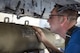 Staff Sgt. Jonathon Greg, 74th Aircraft Maintenance Unit crew chief, lines up a MK84 bomb on an A-10C Thunderbolt II during a quarterly weapons load competition, Nov. 16, 2017, at Moody Air Force Base, Ga. Judges evaluated the competitors based on dress and appearance, a knowledge exam and loading various munitions to determine the swiftest and most efficient load crew. (U.S. Air Force photo by Airman Eugene Oliver)