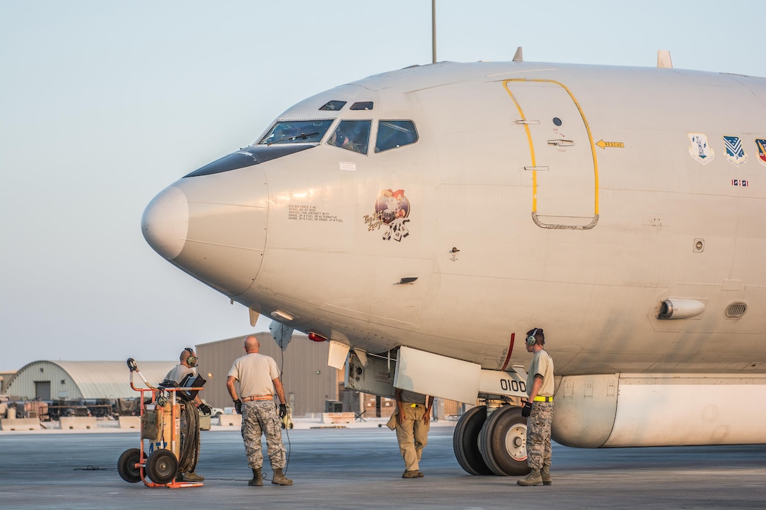 Air Force maintainers assigned to the 7th Aircraft Maintenance Unit, perform post-flight checks on an E-8C Joint Surveillance Target Attack Radar System.