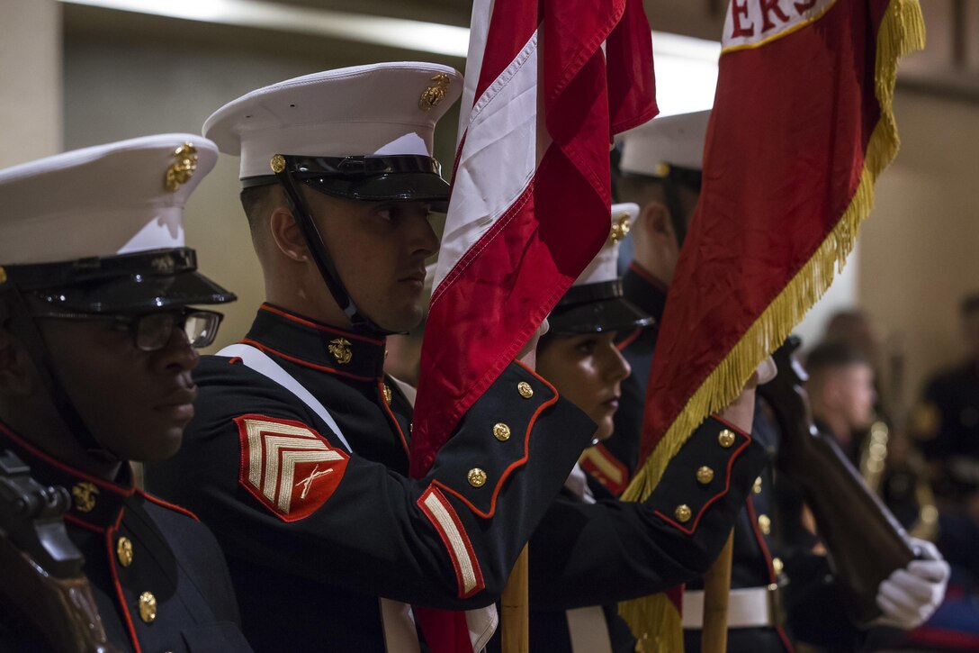 U.S. Marines with the Headquarters Battalion Color Guard, Marine Corps Base Hawaii, participate in the ceremony for the 242nd Marine Corps Birthday Ball, at Hilton Hawaiian Village, Honolulu, Hawaii, Nov. 11, 2017. Each year Marines across the globe celebrate the date on which the Marine Corps was founded and the proud legacy that it's many years of existence has wrought. (U.S. Marine Corps photo by Sgt. Alex Kouns)