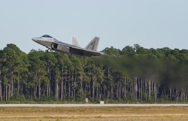 An F-22 Raptor from the 525th Fighter Squadron, Joint Base Elmendorf-Richardson, Alaska, takes off of from the Tyndall Air Force, Fla., flightline Nov. 15, 2017