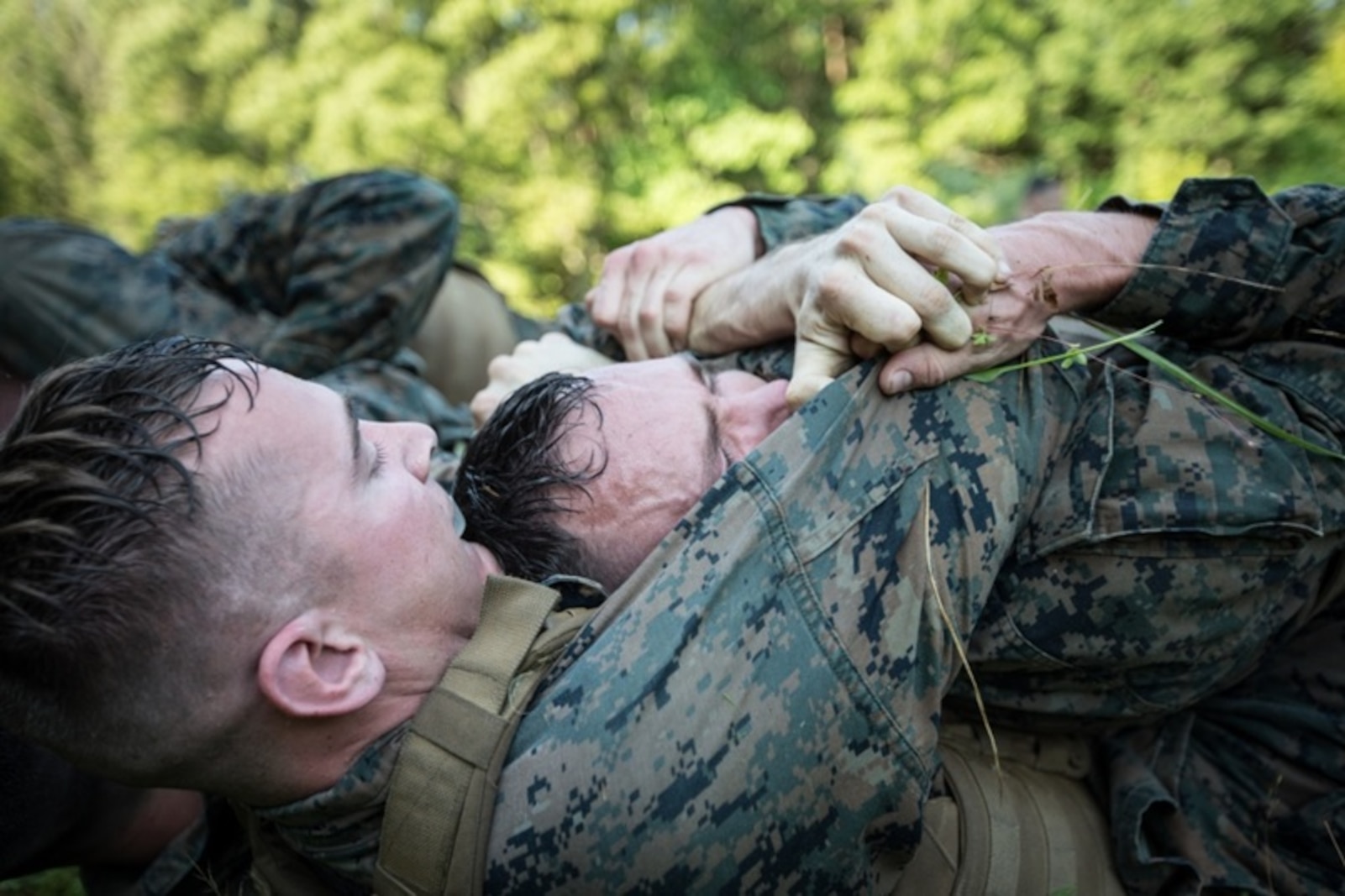 U.S. Marines participate in ground free sparring during the culminating event of the Martial Arts Instructor Trainer course aboard Marine Corps Base Quantico, VA., June 21, 2017.