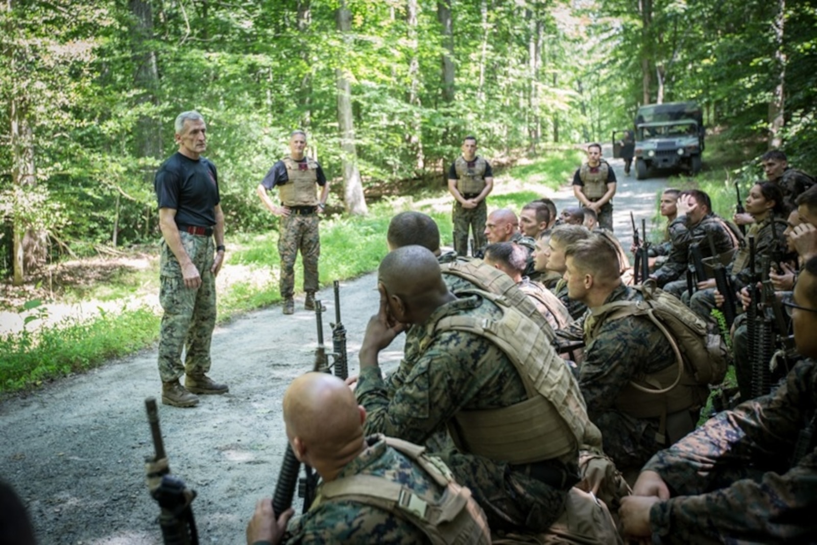 U.S. Marine Corps Lt. Col. (ret.) Joseph Shusko (left) speaks to the students of the Martial Arts Instructor Trainer Course aboard Marine Corps Base Quantico, VA., June 21, 2017.