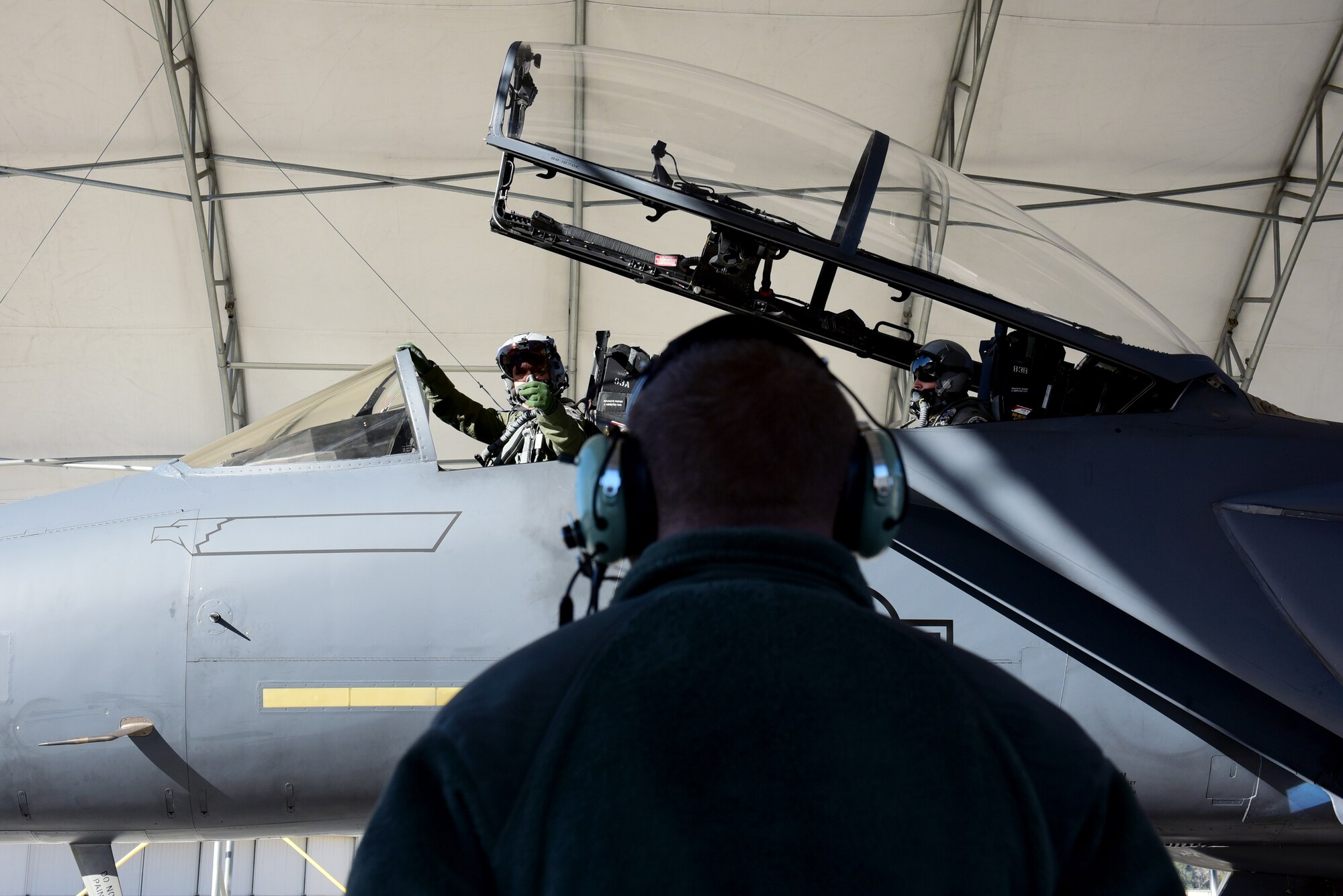 An F-15E Strike Eagle pilot and weapon systems operator with the 335th Fighter Squadron, prepare to taxi to participate in exercise Razor Talon, Nov. 17, 2017, at Seymour Johnson Air Force Base, North Carolina. The exercise provides service members a unique opportunity to participate in a monthly large-force training exercise for joint East Coast tactical and support aviation units. (U.S. Air Force photo by Airman 1st Class Kenneth Boyton)