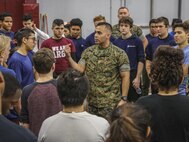 SUMMIT, Ill – Sergeant Mario Bermudez, a recruiter with Marine Corps Recruiting Sub Station Oak lawn, Recruiting Station Chicago, talks to students and poolees during the Semper Fi Saturday event in Summit, Illinois., Nov. 4. Semper Fi Saturday is an event that was created by the Marines of Recruiting Substation Oak Lawn in 2010,  to give high school students appreciation of the Marine Corps by giving them a first-hand experience into how Marines are made. (U.S. Marine Corps photo by Cpl. Quavaungh Pointer)