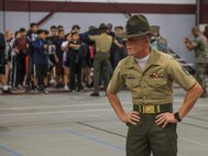 SUMMIT- U.S. Marine Corps SSgt. Edward Baracree, Drill Instructor with 3rd battalion, Kilo Company, Marine Corps Recruit Depot Parris Island, stares at a student during the Semper Fi Saturday event in Summit, Illinois., Nov. 4. Semper Fi Saturday is an event that was created by the Marines of Recruiting Substation Oak Lawn in 2010,  to give high school students appreciation of the Marine Corps by giving them a first-hand experience into how Marines are made. (U.S. Marine Corps photo by Cpl. Quavaungh Pointer)