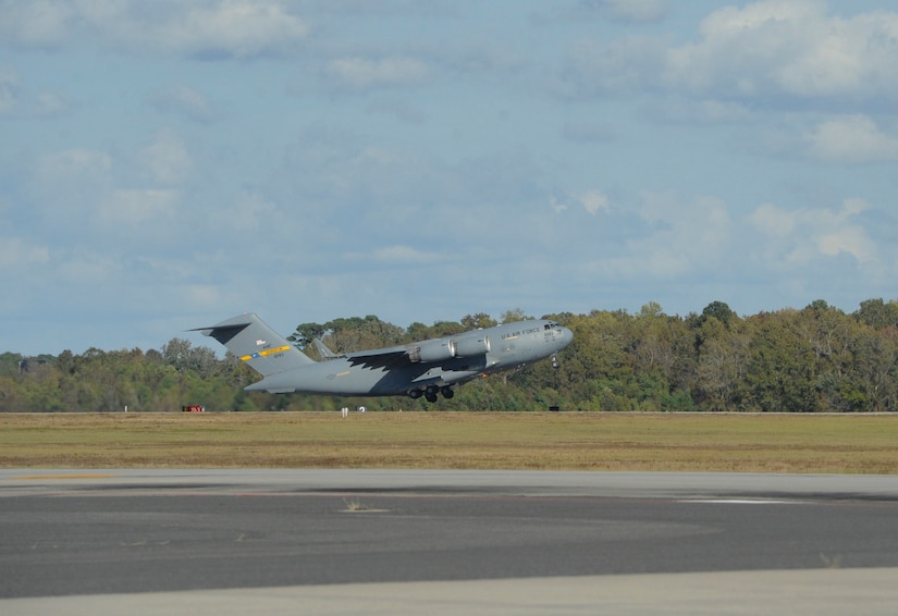 A C-17 Globemaster III aircraft takes off from Joint Base Charleston with equipment headed for Argentina, Nov. 18, 2017. Joint Base Charleston's efforts are helping aid the search and rescue of the A.R.A. San Juan, an Argentine navy submarine that went missing Nov. 15, 2017. As part of the support, two C-17 Globemaster IIIs and one C-5M Super Galaxy from Air Mobility Command are delivering needed equipment and expertise to assist a partner nation. The first flight from Joint Base Charleston is carrying a tow bar, a Tunner 60K Aircraft Cargo Loader and three members of the 437th Aerial Port Squadron. While on the ground, the team will be conducting runway assessments prior to other equipment arriving in country. Additional U.S. Air Force support will be provided to aid efforts.