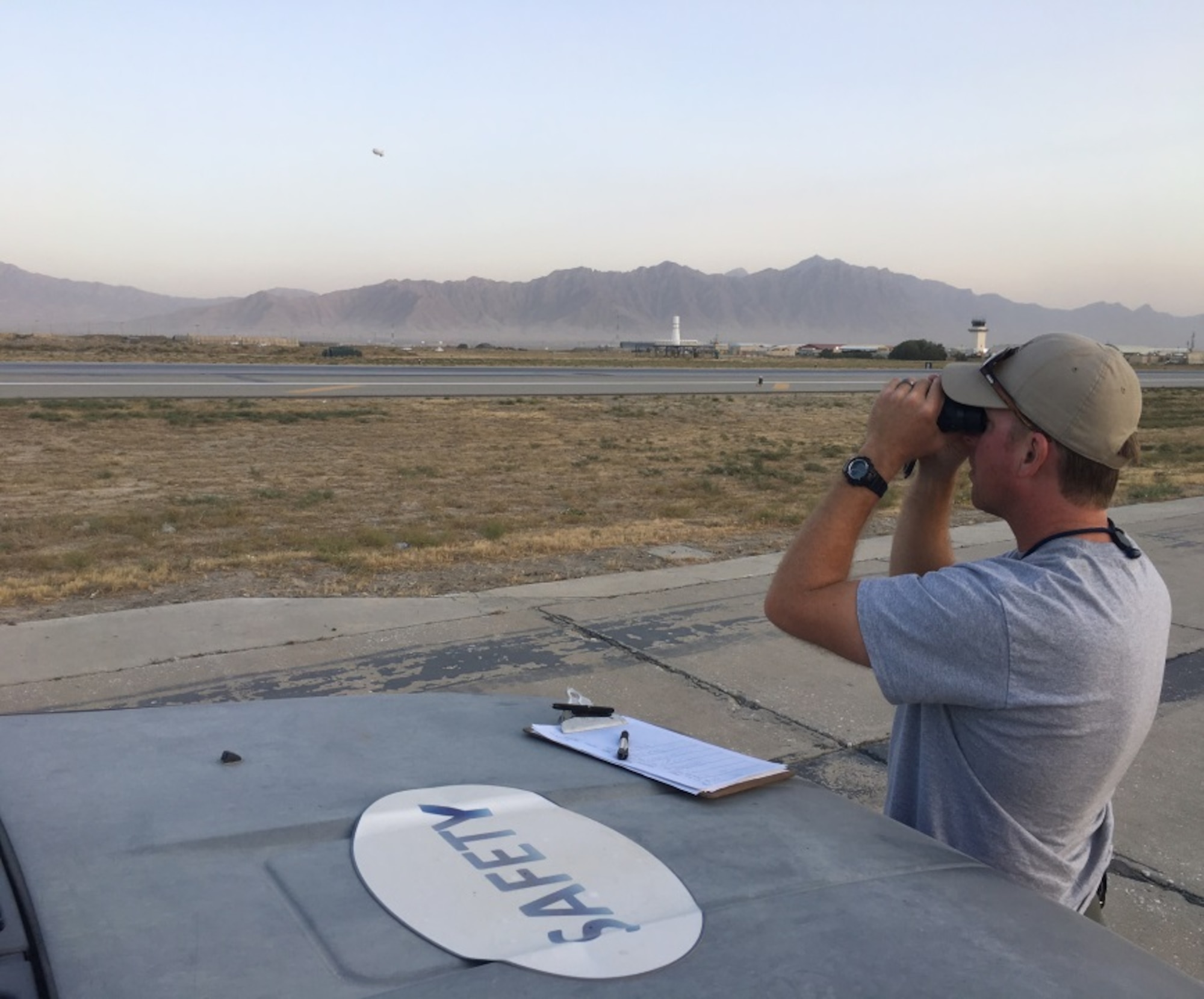 James Capps, 455th Air Expeditionary Wing U.S. Department of Agriculture (APHIS) and BASH forward operating base biologist, surveys the airfield Nov. 21, 2017 at Bagram Airfield, Afghanistan.