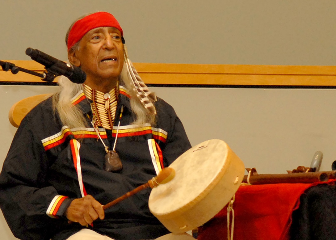 Kenneth Little Hawk, a descendent of the Micmac and Mohawk tribes, performs a song during the National American Indian Heritage Month program Nov. 14. Little Hawk encouraged the Naval Support Activity Philadelphia audience to accept people of all colors and creeds.