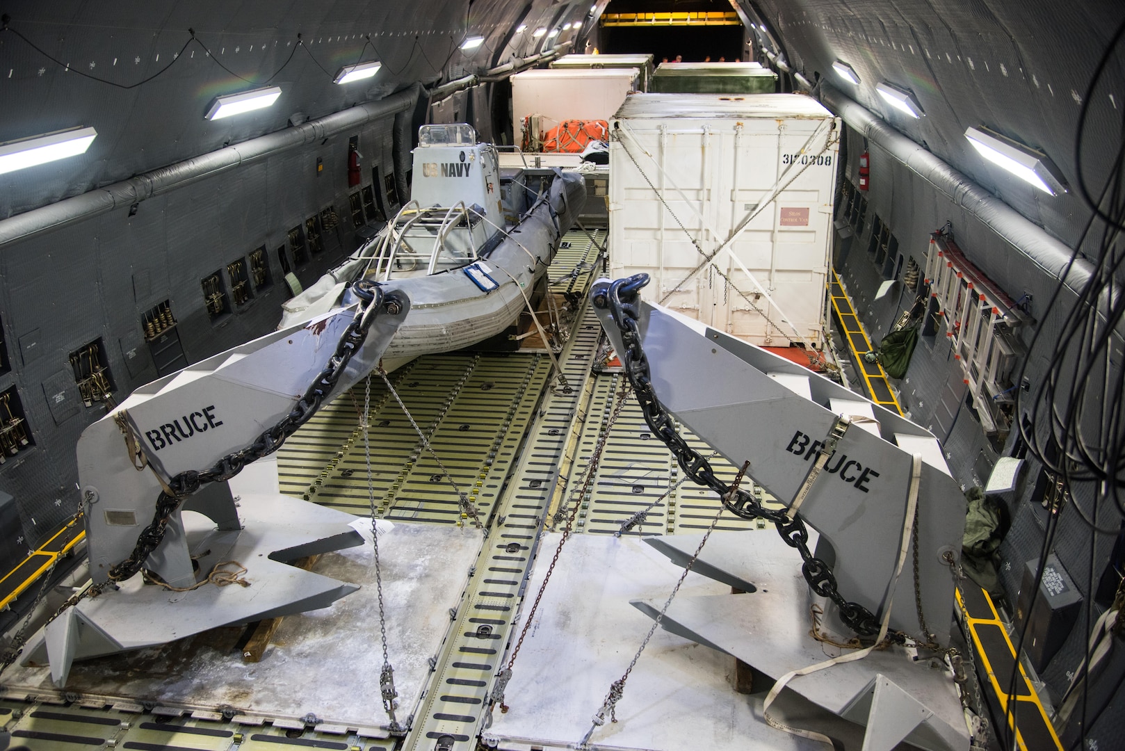 A U.S. Air Force C-5M Super Galaxy aircraft from the 22nd Airlift Squadron is loaded with U.S Navy rescue equipment at Marine Corps Air Station Miramar, Calif., Nov. 18, 2017. The equipment will be delivered to Argentina and used to aid in the search for the Argentina Navy submarine A.R.A San Juan. Air Mobility Command aircraft are delivering equipment and expertise to assist a partner nation. (U.S. Air Force photo by Staff Sgt. Nicole Leidholm)