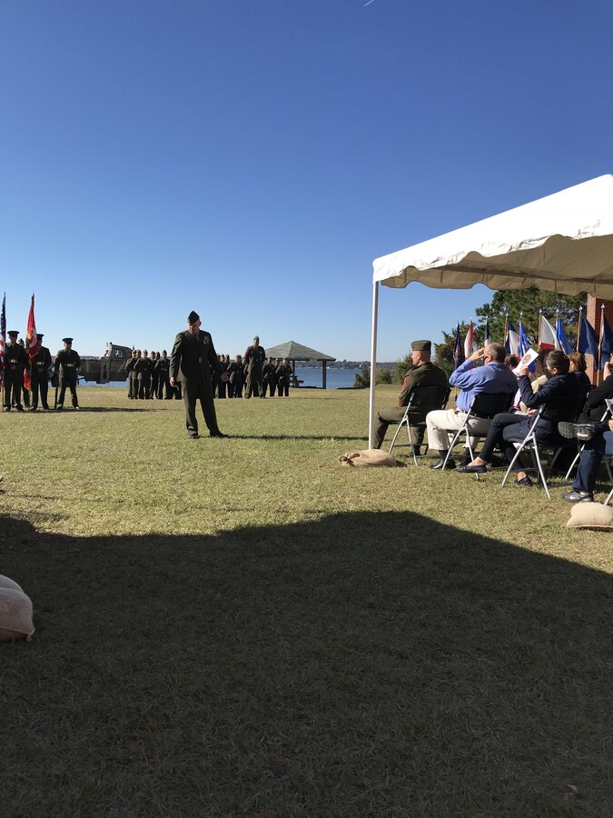 On Friday November 17th, 2017 at Courthouse Bay, Camp Lejeune, N. C., Lieutenant Colonel Mark George delivers remarks during Master Sergeant Shawn W. Fowler's retirement ceremony. LtCol George was the retiring officer and was MSgt Fowler's direct supervisor while he served as the Defeat the Device Branch Head at Marine Corps Engineer School.