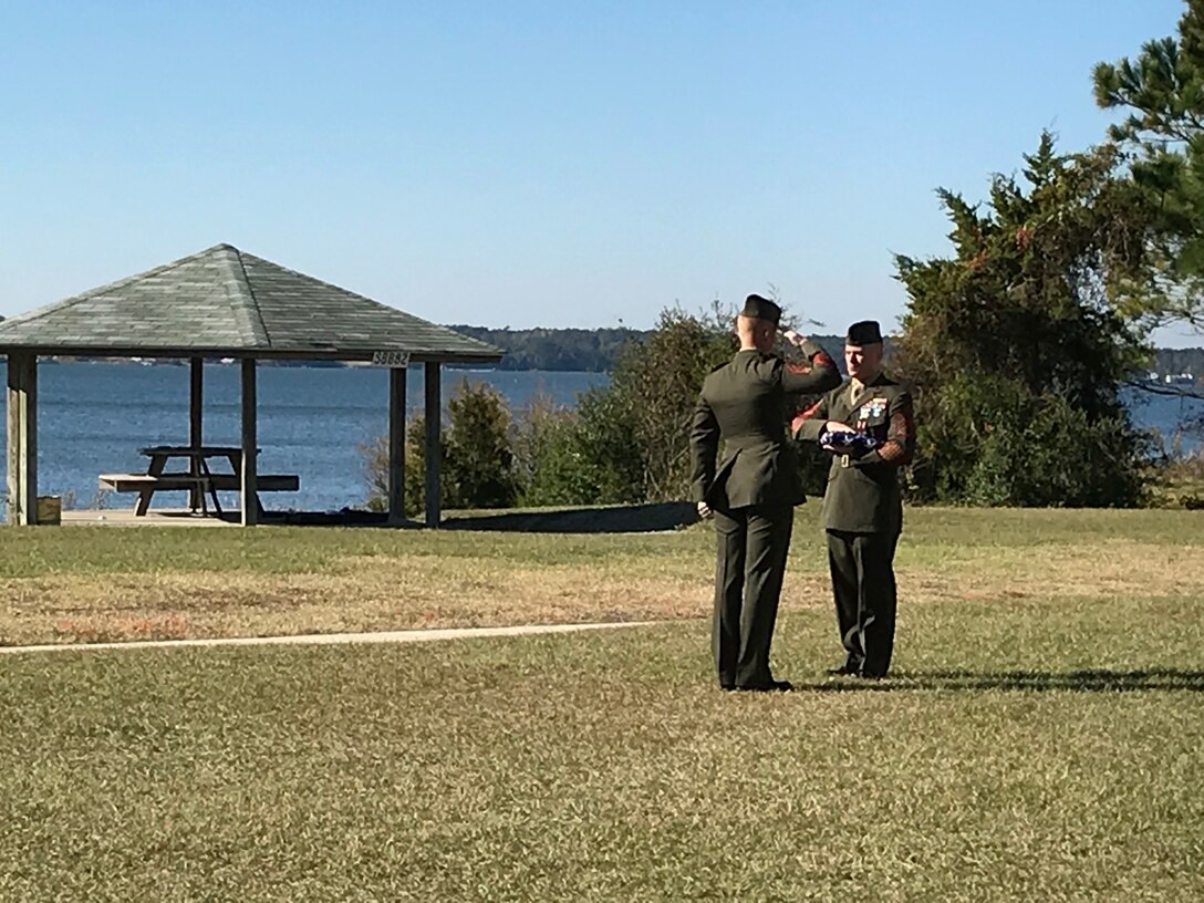 On Friday November 17th, 2017 at Courthouse Bay, Camp Lejeune, N. C., Marines from Marine Corps Engineer School participate in the ‘Passing of Old Glory’ after the retirement ceremony for Master Sergeant Shawn W. Fowler. Starting with the junior-most rank, Marines from Private through Gunnery Sergeant pass a folded American flag to MSgt Fowler as “I Am the Flag” is read.