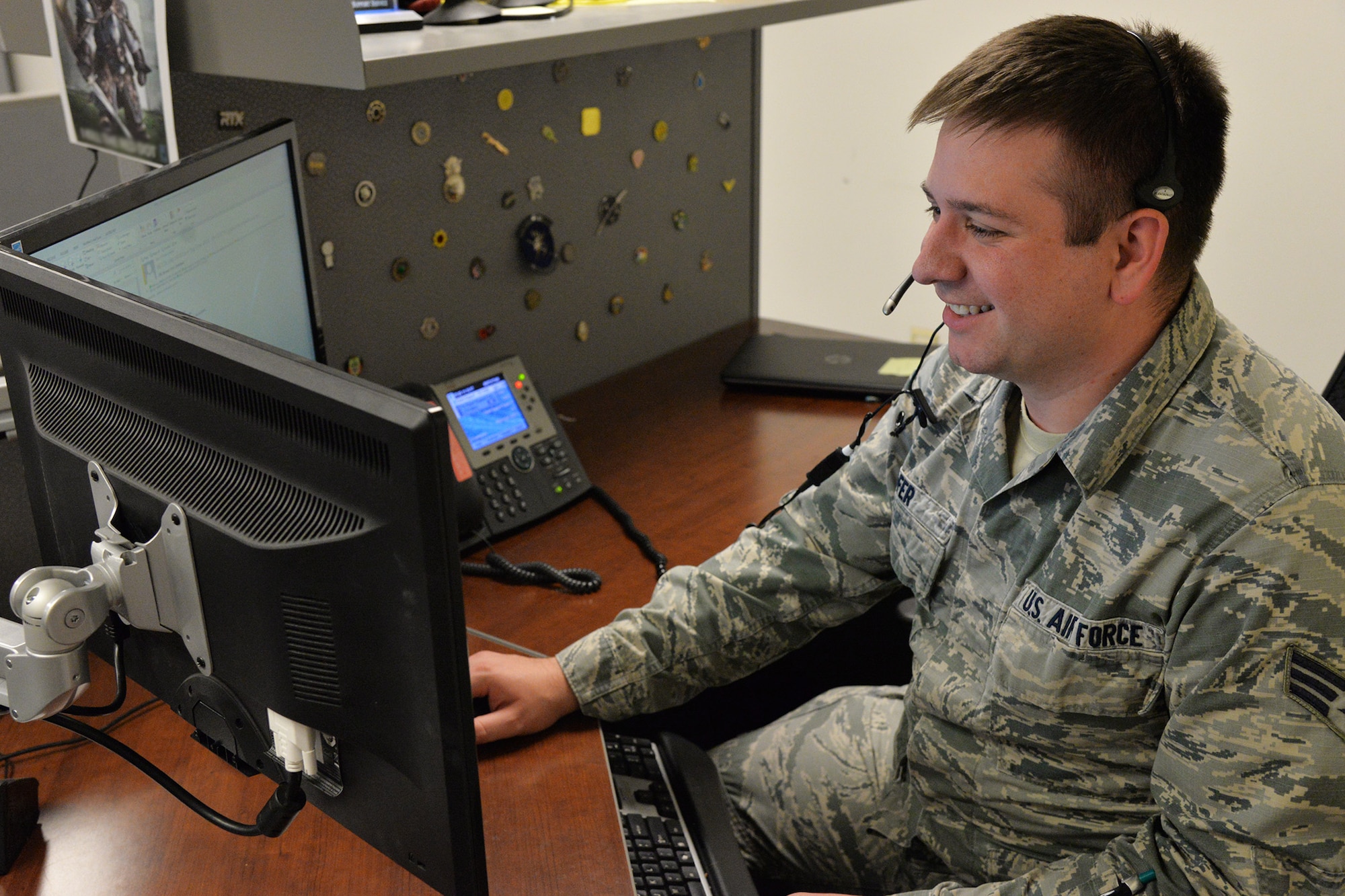 Senior Airman Jeffery Hofer, 341st Communications Squadron client support technician, speaks to a customer Nov. 13, 2017, at Malmstrom Air Force Base, Mont.