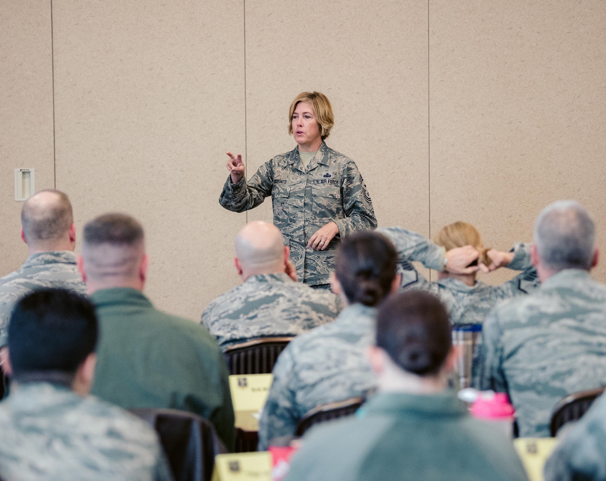 Command Chief Master Sgt. Amy Giaquinto, the senior enlisted advisor to the Adjutant General of New York, speaks to members of the 107th Attack Wing in Niagara Falls, N.Y. on Oct. 17, 2017. Giaqunito is the first woman and the first Air National Guard member to hold that role in New York. (U.S. Air National Guard photo by Staff Sgt. Ryan Campbell)