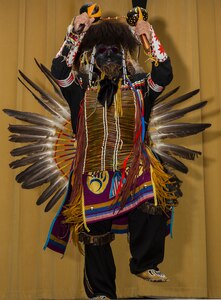 Isaac Cardenas, a member of the American Indians in Texas Dance Theater group, performs a traditional Native American dance at the National American Indian Heritage Month Observance Nov. 16 at the U.S. Army Medical Department Center and School, located at Joint Base San Antonio-Fort Sam Houston.