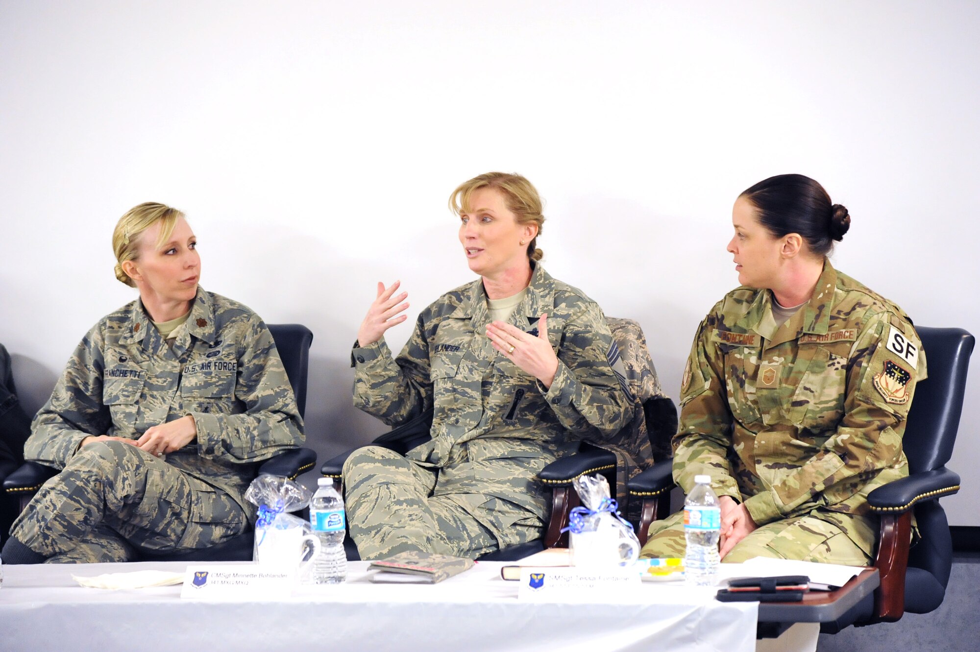 Chief Master Sgt. Minnette Bohlander, 341st Maintenance Group superintendent, center, discusses challenges she faced throughout her career at the first “Let’s Connect” event Nov. 16, 2017, at Malmstrom Air Force Base, Mont. The event’s theme, Lead like a Girl, focused on specific discussion topics including improving workplace relations, controlling emotions and communication up and down the chain of command. (U.S. Air Force photo by Christy Mason)