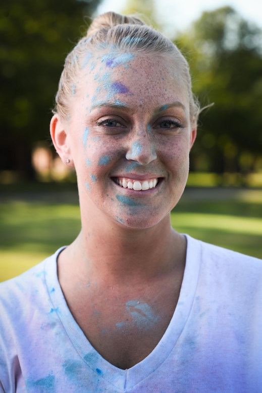 U.S. Air Force Staff Sgt. Adrial Love, 633rd Comptroller Squadron military pay NCO, poses for a photo after a resiliency color run at Joint Base Langley-Eustis, Va., Oct. 20, 2017.