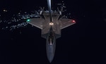 A KC-10 Extender from the 908th Expeditionary Air Refueling Squadron, Al Dhafra Air Base, United Arab Emirates, refuels an F-22 Raptor from the 95th Expeditionary Fighter Squadron in support of a new offensive campaign in Afghanistan Nov. 19, 2017. Afghan National Defense and Security Forces (ANDSF) and United States Forces-Afghanistan (USFOR-A) launched a series of ongoing attacks to hit the Taliban where they are most vulnerable: their revenue streams. Together, Afghan and U.S. forces conducted combined operations to strike drug labs and command-and-control nodes in northern Helmand province. These types of strikes represent the highest level of trust and cooperation between ANDSF and USFOR-A.