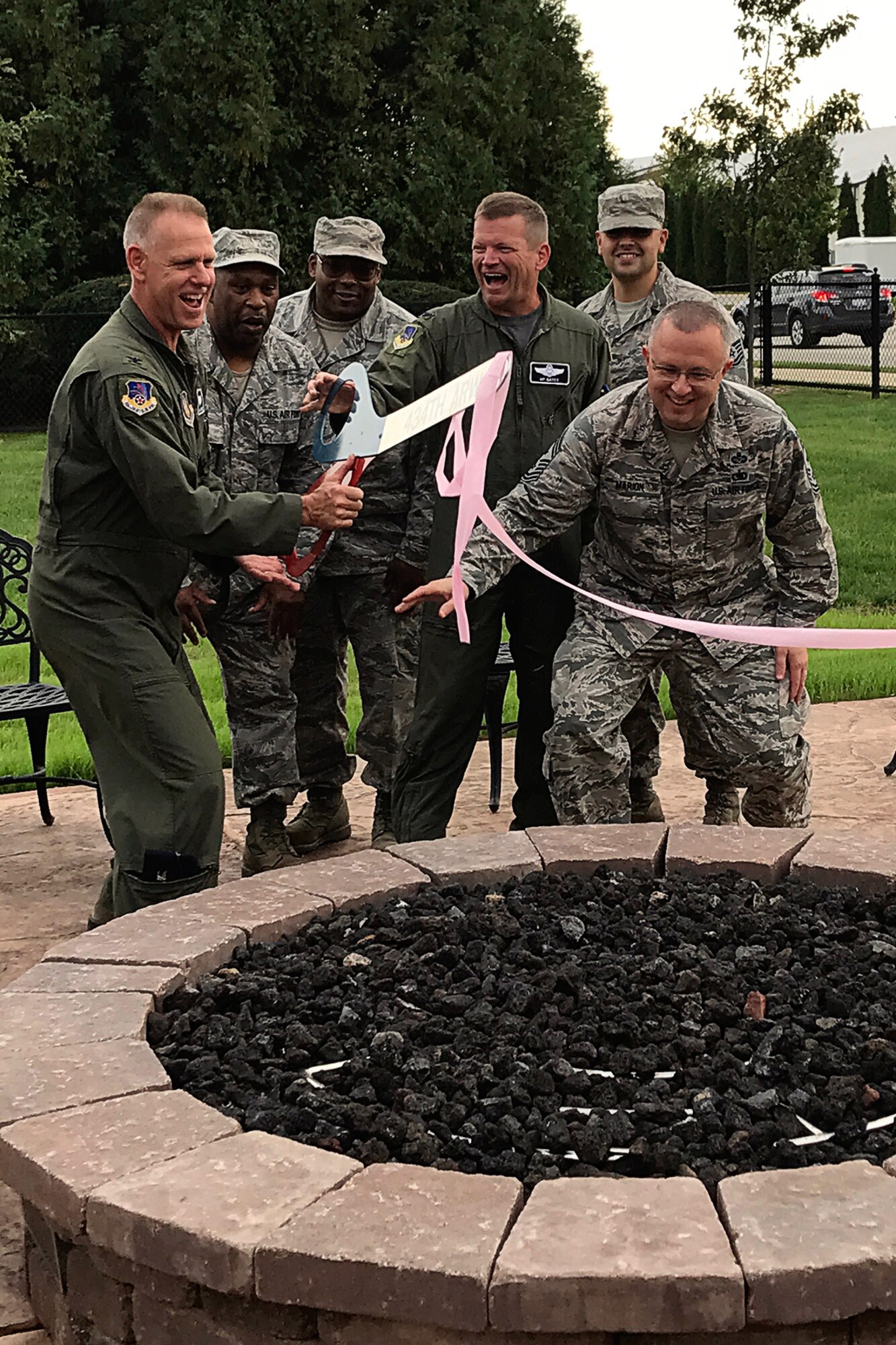 Grissom base leaders cut the ribbon on the base's new fire pit at Grissom Air Reserve Base, Ind. on October 15, 2017.