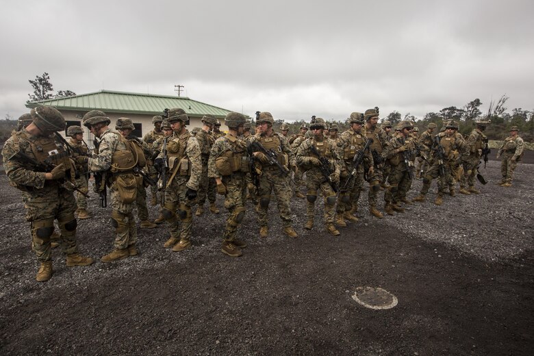 U.S. Marines prepare to participate in the Infantry Platoon Battle Course at the Pohakuloa Training Area on the Island of Hawaii, Oct. 25, 2017. The Marines are with 2nd Battalion, 3rd Marine Regiment, and are conducting IPBC for Exercise Bougainville II. Exercise Bougainville II prepares 2nd Bn., 3rd Marines for service as a forward deployed force in the Pacific by training them to fight as a ground combat element in a Marine Air-Ground Task Force. (U.S. Marine Corps photo by Lance Cpl. Isabelo Tabanguil)