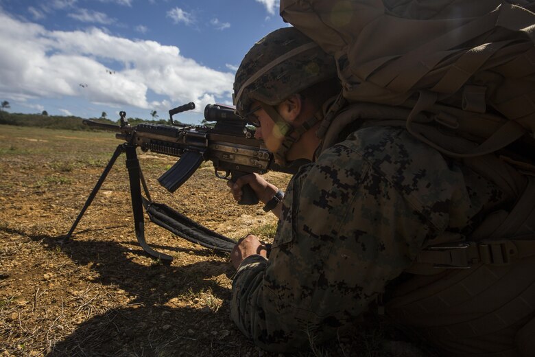 Pvt. Trevor Black provides security during a Tactical Recovery of Aircraft and Personnel training event in Exercise Bougainville II at Landing Zone Boondocker, Marine Corps Base Hawaii, on Oct. 26, 2017. Pvt. Black is a mortarman with 2nd Battalion, 3rd Marine Regiment, and a native of Springhill, Fla. Exercise Bougainville II prepares 2nd Bn., 3rd Marines for service as a forward deployed force in the Pacific by training them to fight as a ground combat element in a Marine Air-Ground Task Force. (U.S. Marine Corp photo by Lance Cpl. Isabelo Tabanguil)