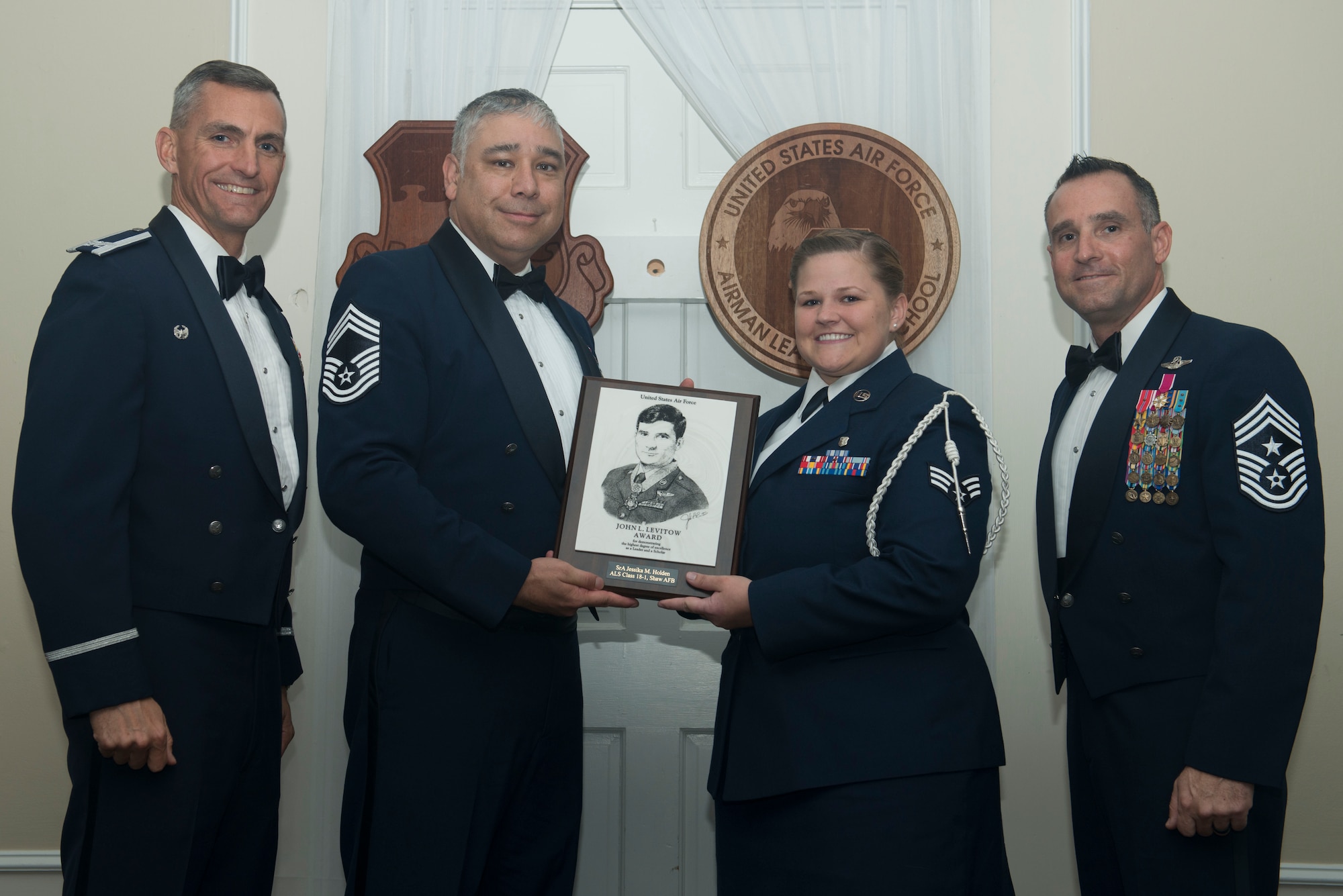 U.S. Air Force Senior Airman Jessika Holden, 20th Medical Operations Squadron, receives the John L. Levitow Award for Class 18-1 of the Senior Master Sgt. David B. Reid Airman Leadership School, at Shaw Air Force Base, South Carolina, Nov. 17, 2017.